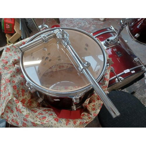 784 - A Performance Percussion five piece drum kit comprising bass drum, floor tom, two rack toms, snare w... 