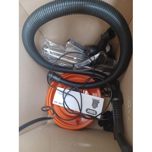 814 - A boxed Vax Wash & Vac 6131 wet and dry vacuum cleaner with attachments and instruction manual