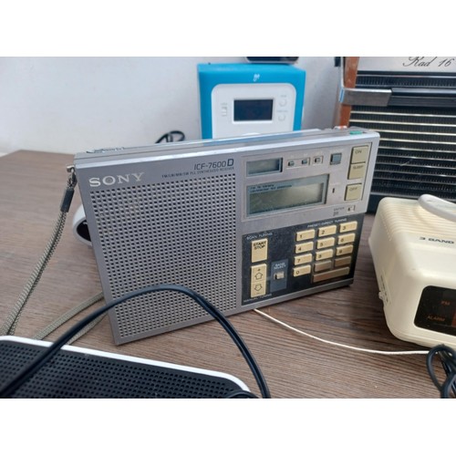 707 - A collection of radios, speakers and clock radios to include Fidelity RAD 16, Sony ICF-7600D four-ba... 