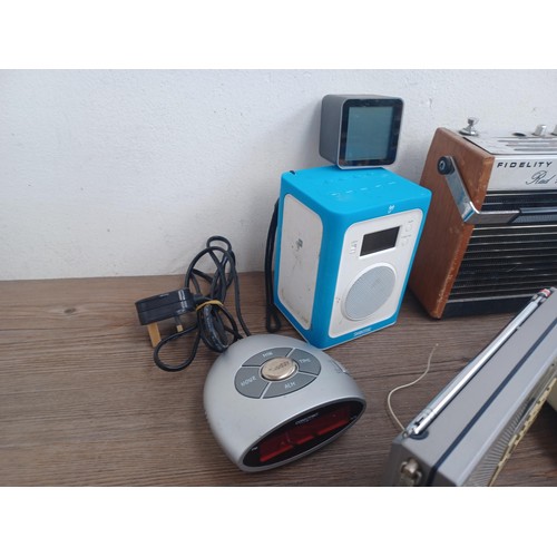 707 - A collection of radios, speakers and clock radios to include Fidelity RAD 16, Sony ICF-7600D four-ba... 