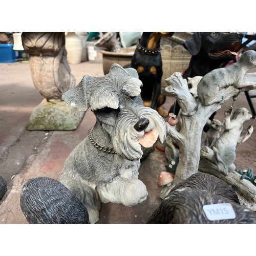 998 - Nine cast stone and fibreglass animal garden ornaments