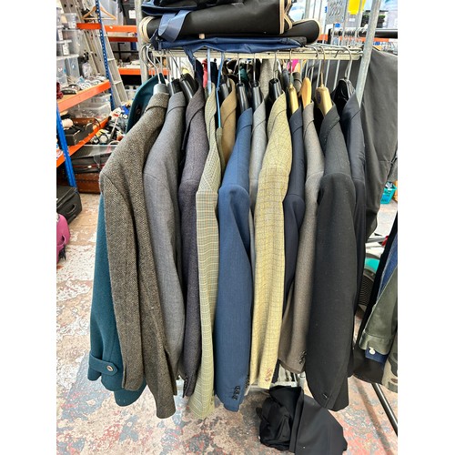 543A - A large quantity of men's clothing to include Barbour sweatshirt, Gannex country jacket, 100% cashme... 