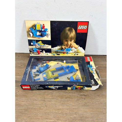 515 - A collection of 1970s Lego construction sets and accessories to include 375 Yellow Castle, 182 Train... 