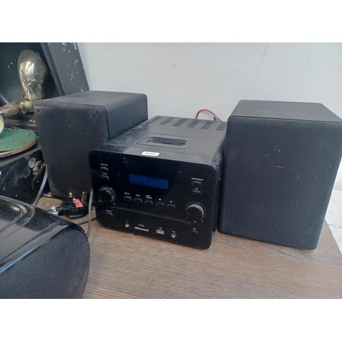 708 - A collection of items to include boxed Sony D-EJ119 Walkman CD player, Goodmans CD player, boxed Gro... 