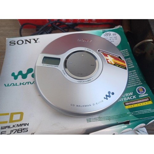 708 - A collection of items to include boxed Sony D-EJ119 Walkman CD player, Goodmans CD player, boxed Gro... 