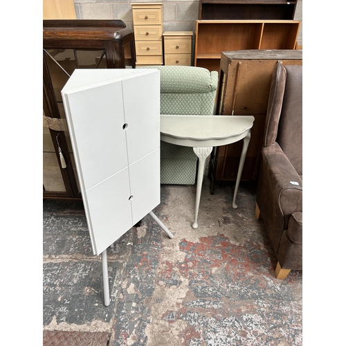 53 - Two pieces of furniture, one white laminate tripod pedestal corner cabinet and one grey painted half... 