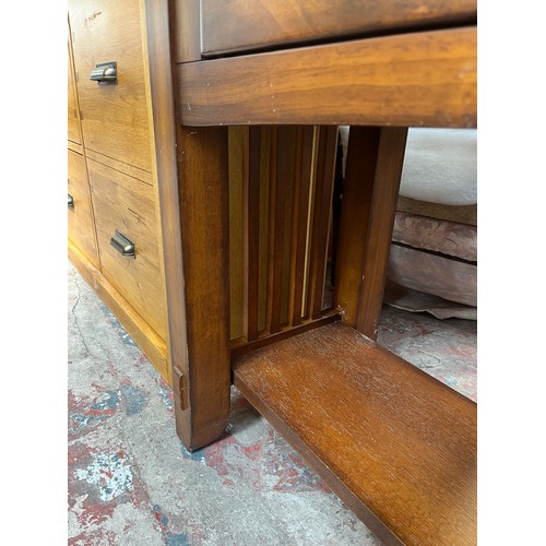 97 - An Arts & Crafts style oak two drawer console table - approx. 72cm high x 127cm wide x 46cm deep