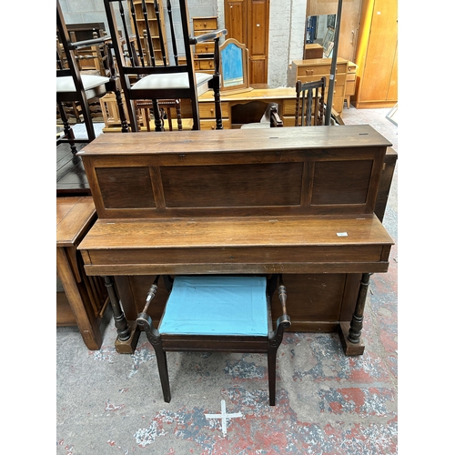 98 - An early 20th century John Broadwood & Sons London rosewood upright piano with stool