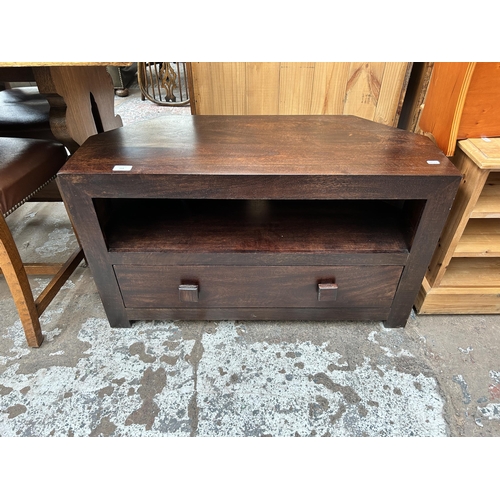 107 - A mango wood TV stand