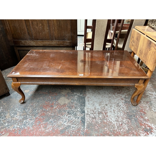 147 - A mahogany rectangular coffee table with cabriole supports