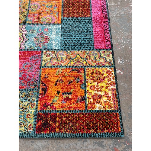 48 - A Happiness multi coloured rug - approx. 200cm x 140cm