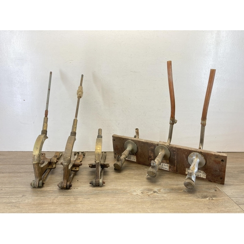 379 - Four pieces of breweriana to include Gaskell & Chambers Dalex brass beer pumps, two dated 1963 and o... 