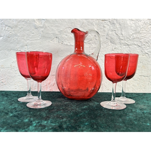 298 - Five pieces of Victorian cranberry glassware