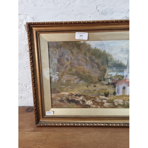 227 - A gilt framed oil painting of a church scene - approx. 34cm high x 50cm wide