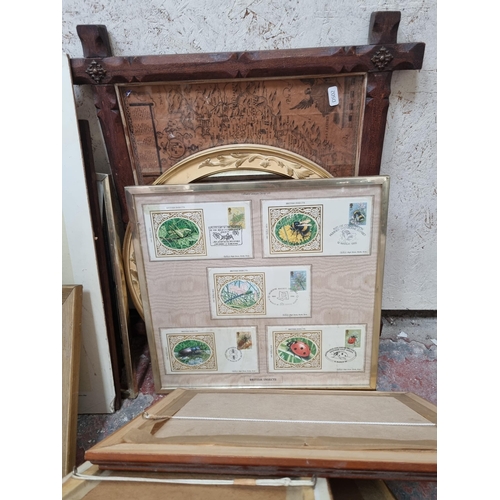 228A - A collection of framed pictures to include map of Chester, Benham Christmas Pantomime silk covers et... 