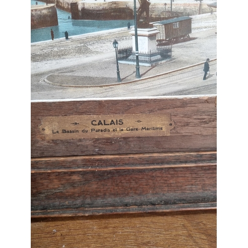 233 - Two oak framed Calais prints