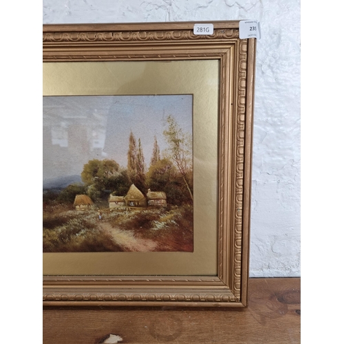 235 - A late 19th/early 20th century gilt framed oil painting of a landscape scene - approx. 41cm high x 6... 