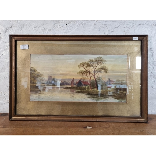 243 - A late 19th/early 20th century gilt framed watercolour of a cottage and lake scene signed W. Frankly... 