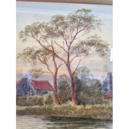 243 - A late 19th/early 20th century gilt framed watercolour of a cottage and lake scene signed W. Frankly... 