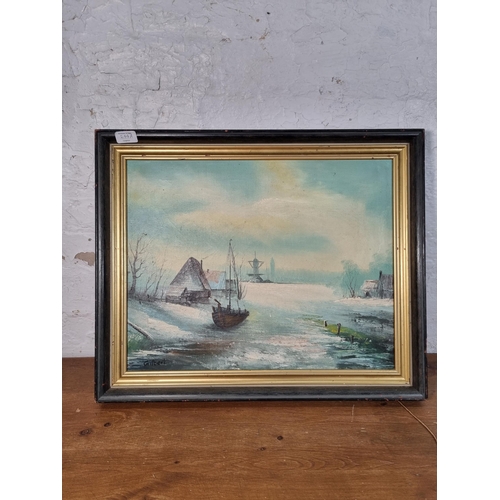 244A - A framed oil on canvas of a winter landscape scene signed Gilbert - approx. 49cm high x 59cm wide