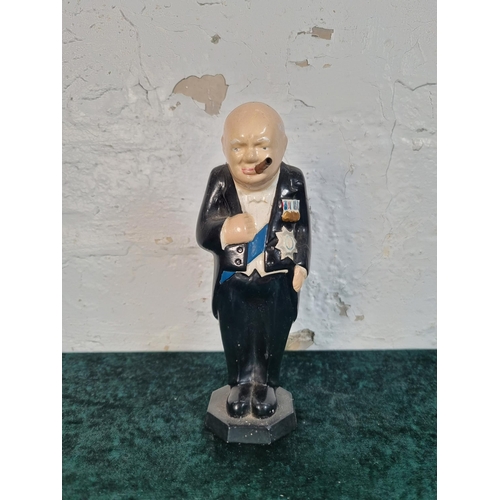 258 - A chalkware figurine of Winston Churchill - approx. 19cm high