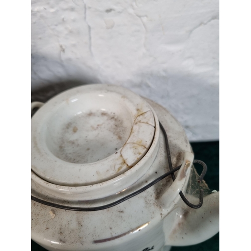 269 - A Chinese republic period porcelain teapot with cup and wicker basket