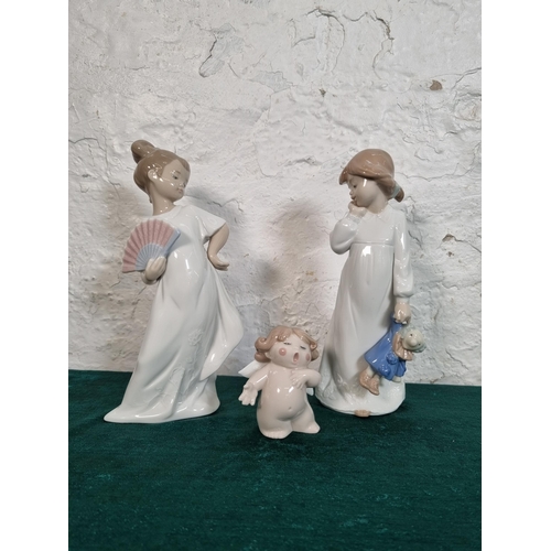 285 - Three Nao porcelain figurines