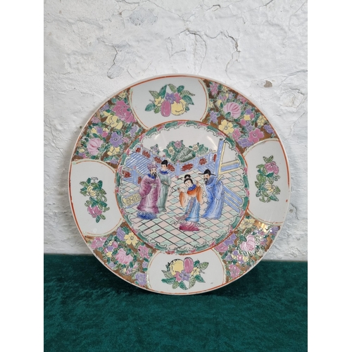 291 - A Chinese Famille Rose charger - approx. 30cm diameter