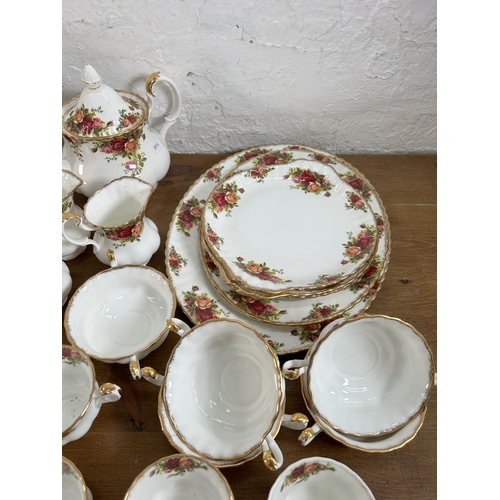 299 - A collection of Royal Albert Old Country Roses bone china to include twenty two teacups, twenty thre... 