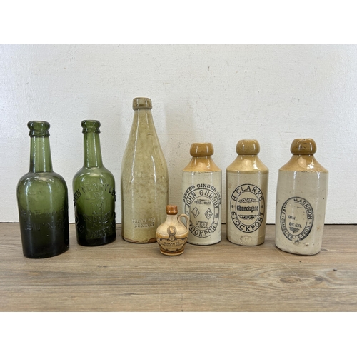 300 - Seven early 20th century stoneware and glass bottles to include J. Lawson Buxton, H. Clarke Stockpor... 