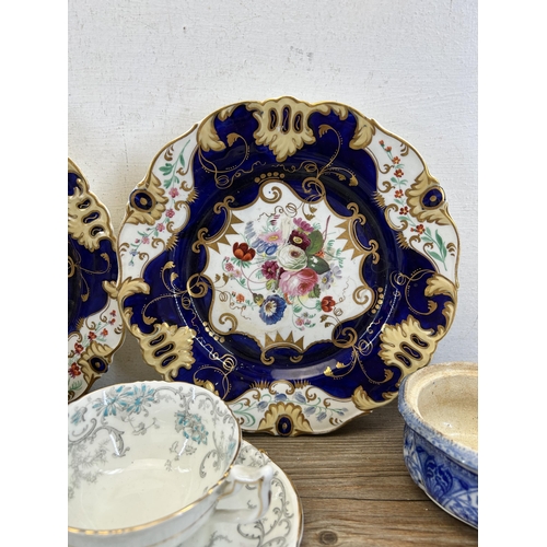 310 - A collection of 19th century and later ceramics to include two hand painted floral pattern plates - ... 