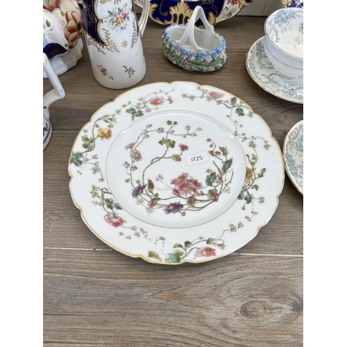 310 - A collection of 19th century and later ceramics to include two hand painted floral pattern plates - ... 