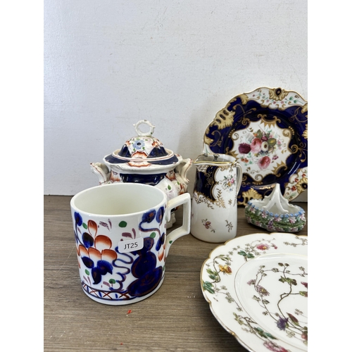 310 - A collection of 19th century and later ceramics to include two hand painted floral pattern plates - ... 