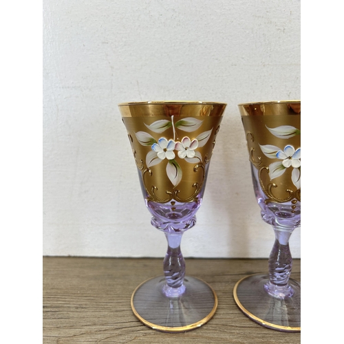 311 - Thirteen pieces of glassware to include eight Murano Venezia Glass wine glasses - approx. 15cm high