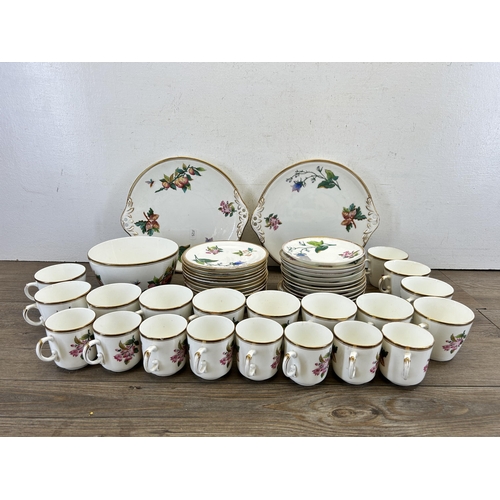 313 - A 19th century hand painted porcelain forty seven piece tea/coffee set