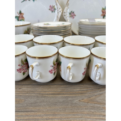 313 - A 19th century hand painted porcelain forty seven piece tea/coffee set