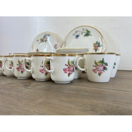 313 - A 19th century hand painted porcelain forty seven piece tea/coffee set