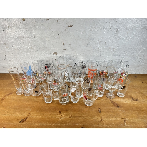 315 - Forty four advertising drinking glasses to include Estrella, Hobgoblin, BrewDog, Camden Town, Vocati... 