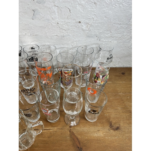 315 - Forty four advertising drinking glasses to include Estrella, Hobgoblin, BrewDog, Camden Town, Vocati... 