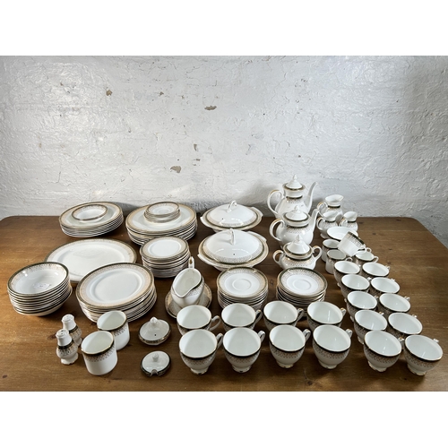 317 - A collection of Royal Grafton Majestic bone china to include five coffee cups, eighteen teacups, tea... 