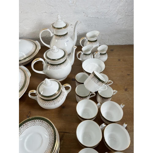 317 - A collection of Royal Grafton Majestic bone china to include five coffee cups, eighteen teacups, tea... 