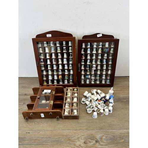 319 - A collection of ceramic thimbles