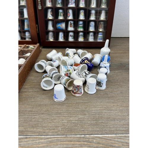 319 - A collection of ceramic thimbles