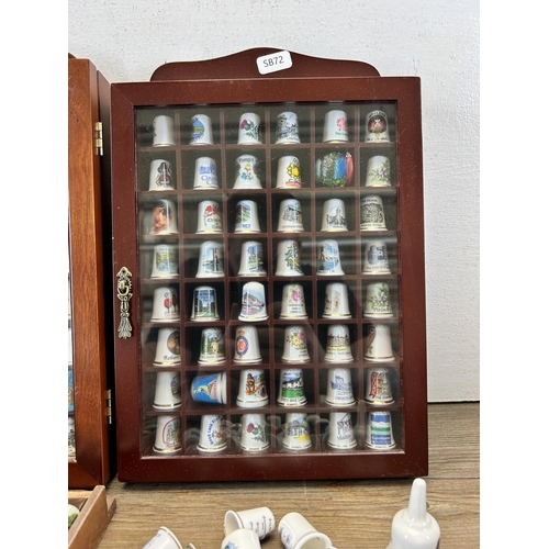 319 - A collection of ceramic thimbles