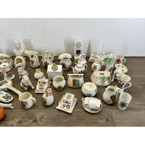 321 - A collection of crested china to include Swan china, W.H. Goss, Grafton china, Wiltshaw & Robinson C... 