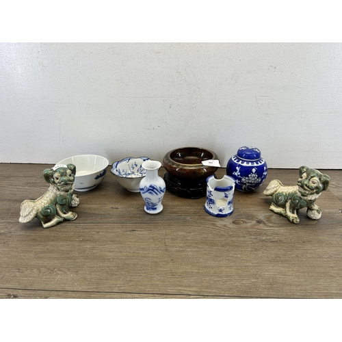 327 - A collection of Oriental items to include Prunus Blossom ginger jar and cover, pair of foo dog figur... 