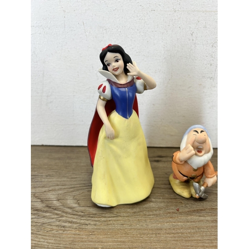 333 - Eight Disney Snow White and the Seven Dwarfs ceramic figurines