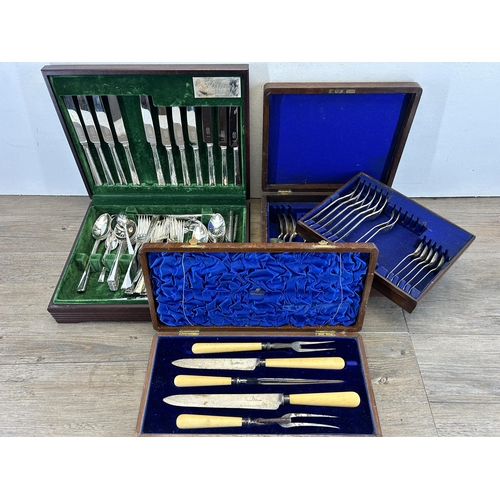 348 - Three canteens of cutlery to include Butlers of Sheffield, Cavendish mahogany cased etc.