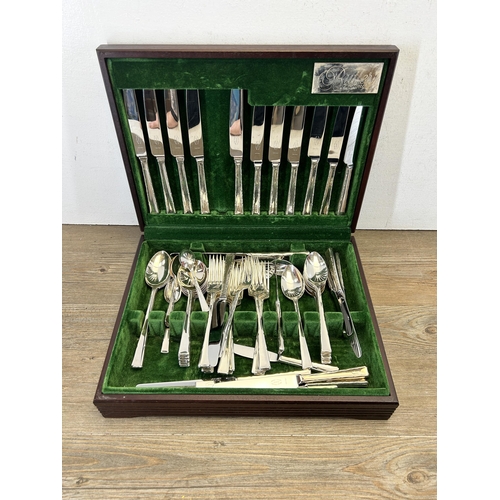 348 - Three canteens of cutlery to include Butlers of Sheffield, Cavendish mahogany cased etc.