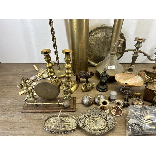 351 - A collection of 19th century and later metalware to include two brass ashtrays on pedestal base, WWI... 